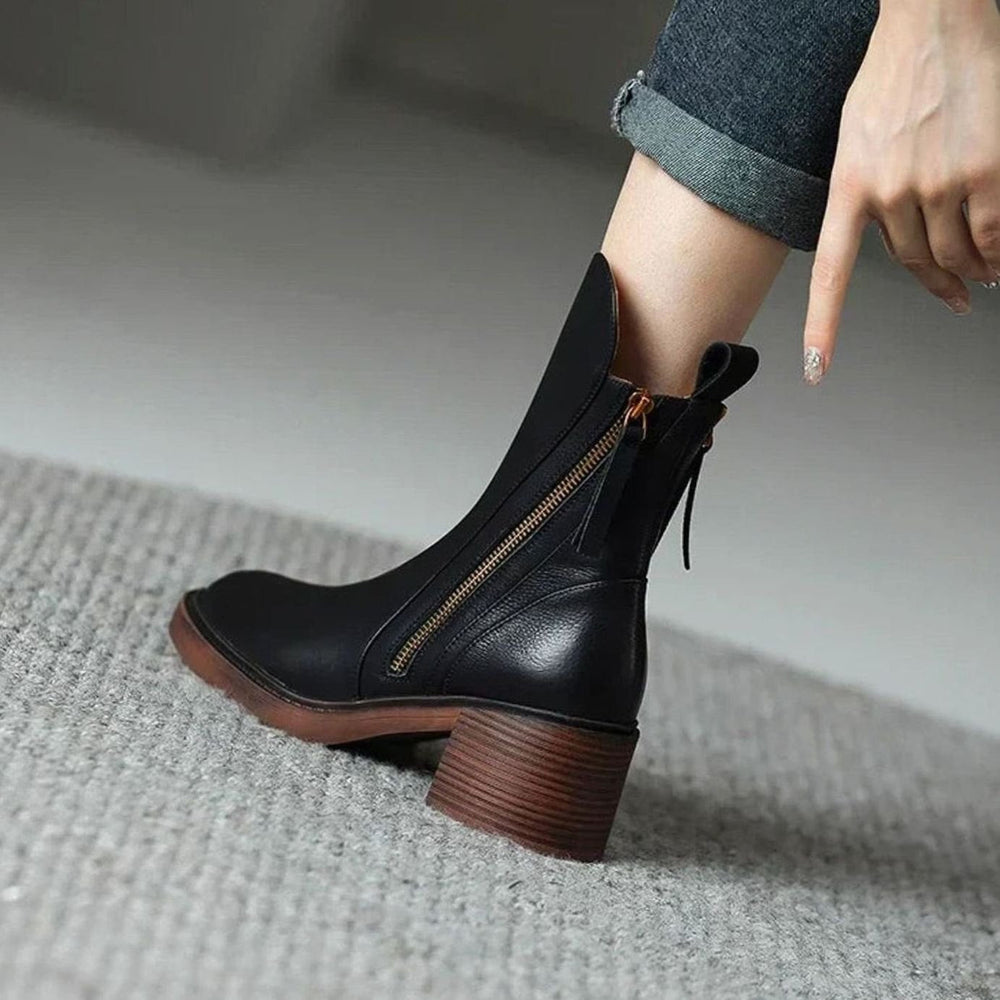 Marguerite black zip-up ankle boot, rear detail view