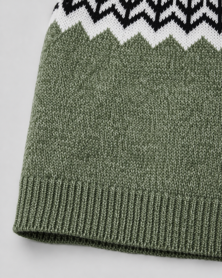 Wren Fair Isle mock neck sweater, close-up of ribbed hem and knit pattern