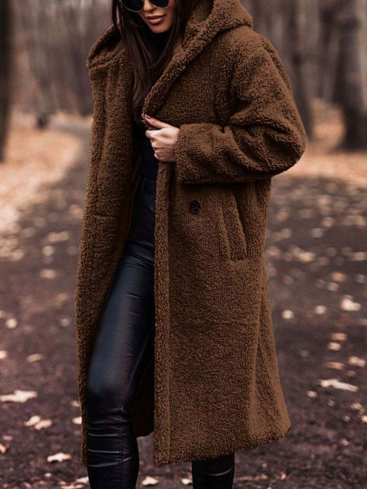 Wren hooded teddy coat in brown, front view with hands in pockets