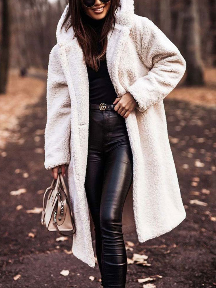 Wren hooded teddy coat in white, walking pose with handbag