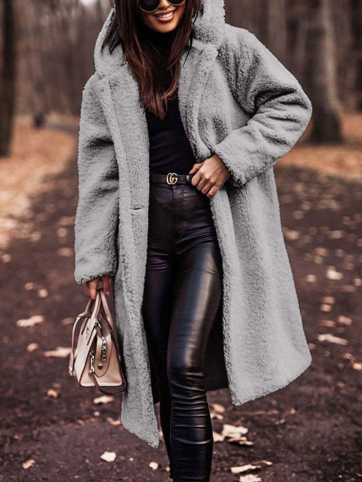 Wren hooded teddy coat in gray, walking pose with handbag