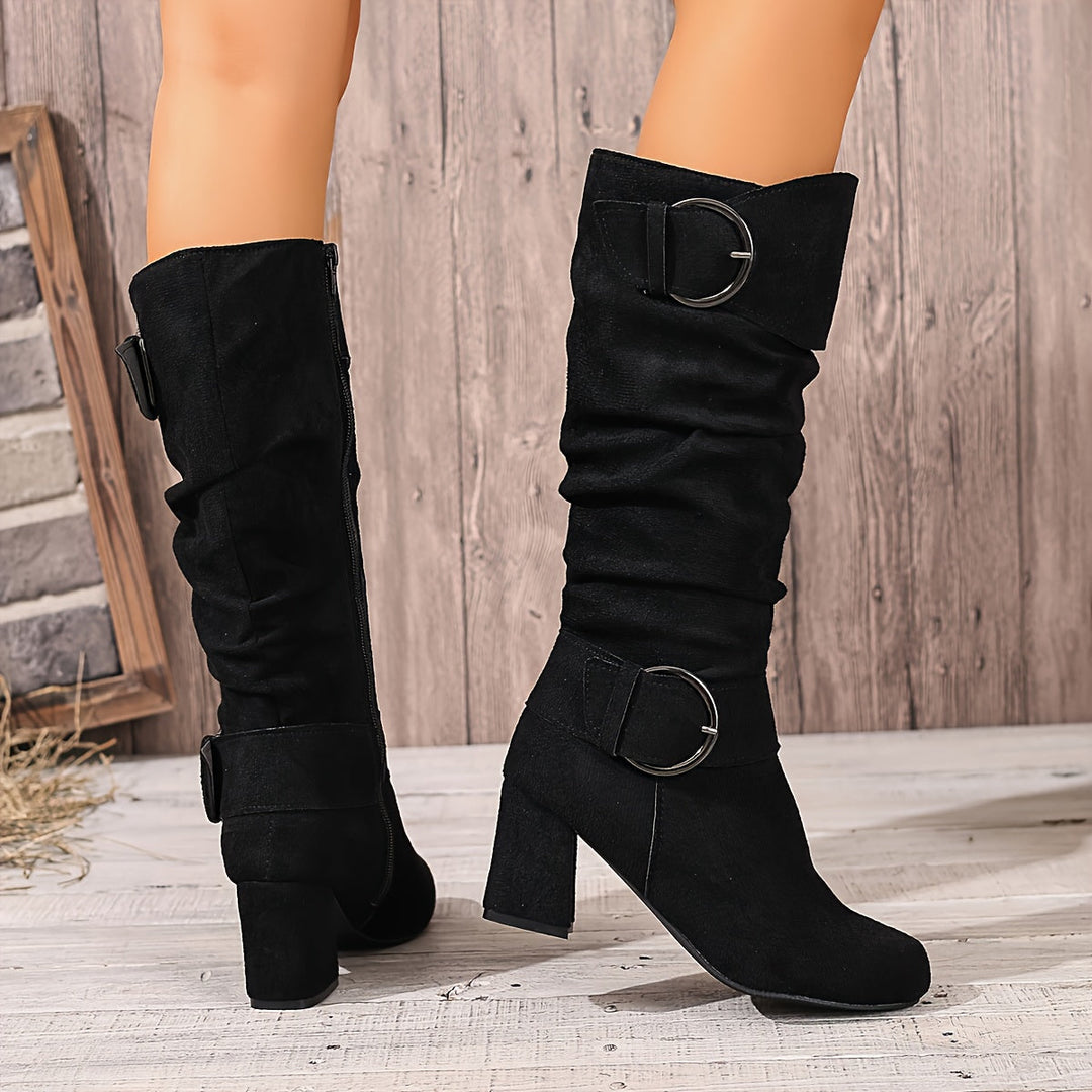 Wren slouchy knee-high boots in black, back view standing