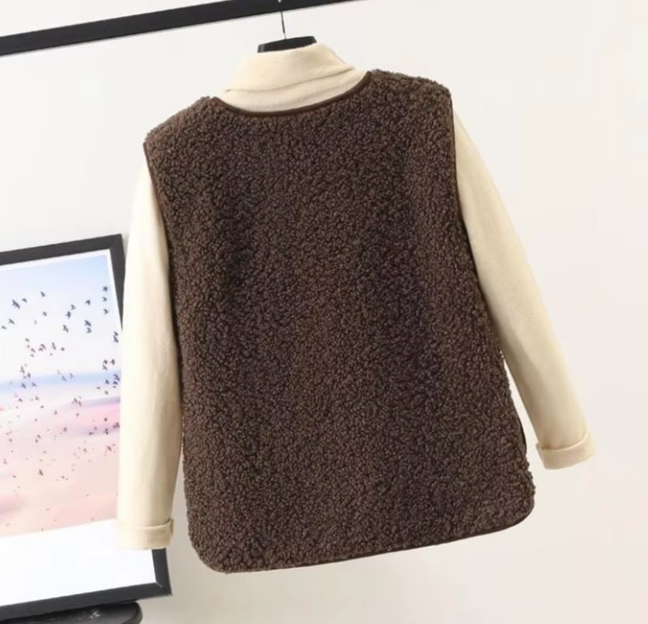 Wynnie sherpa fleece vest in brown, back view styled with turtleneck