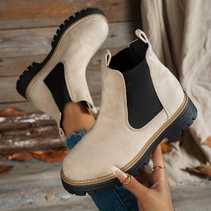 Wynter Chelsea boots in beige, top view with sole detail