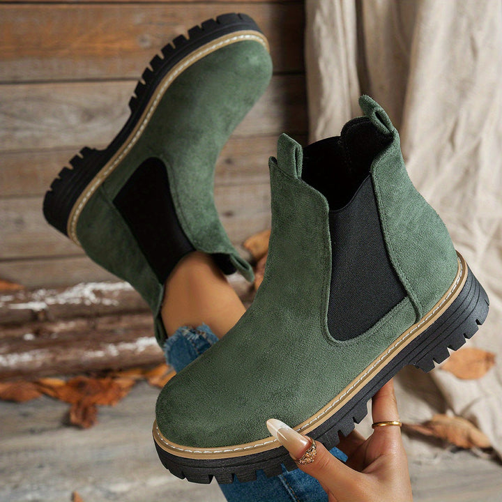 Wynter Chelsea boots in green, top view with sole detail